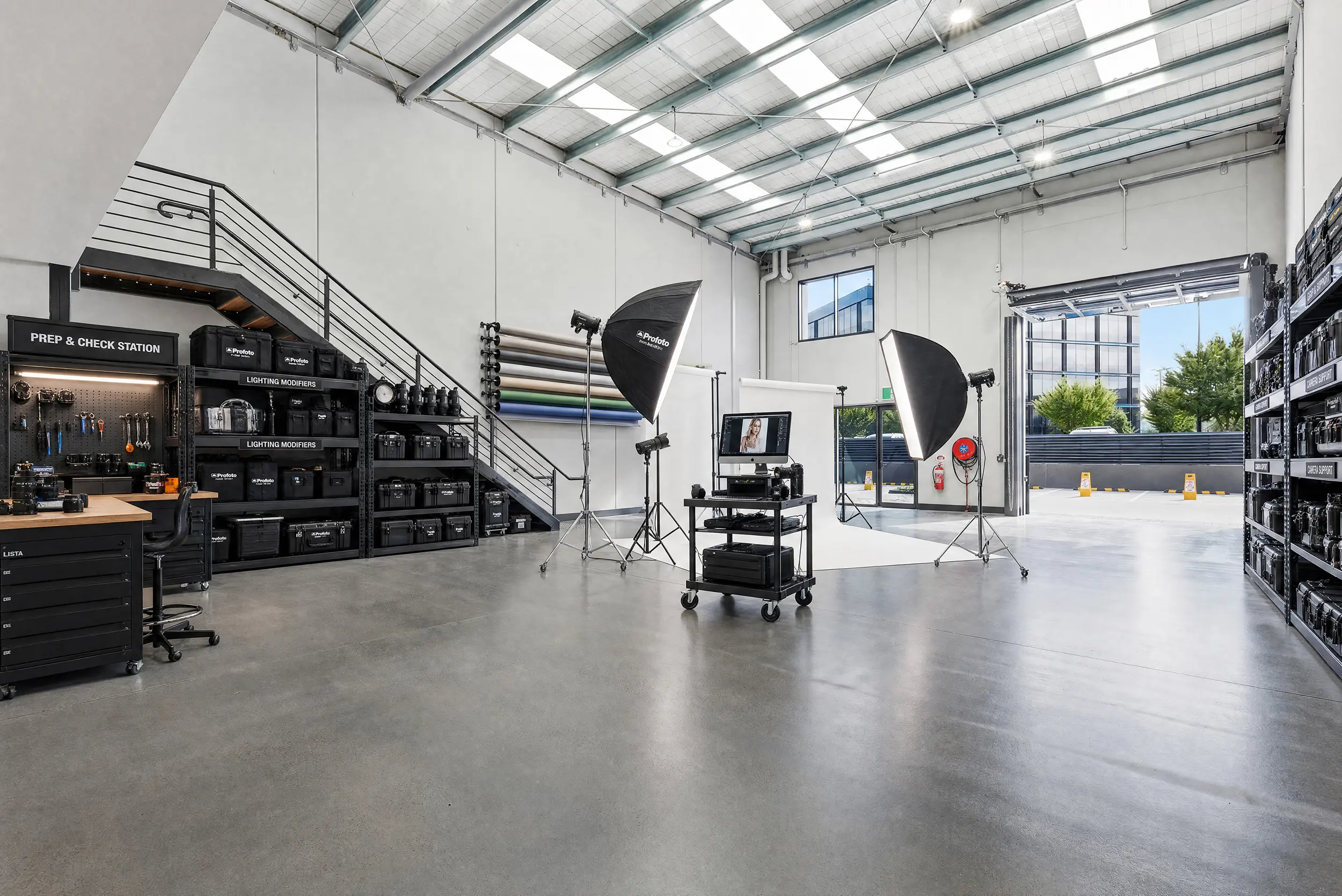 A Jacoah Place tenancy styled as a photography studio, using the double-height ceiling and skylights for a full lighting setup